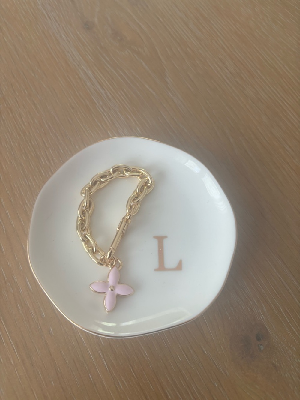 Pink and gold bag charm